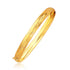 Classic Floral Carved Bangle in 14k Yellow Gold (6.0mm) by Bids.com