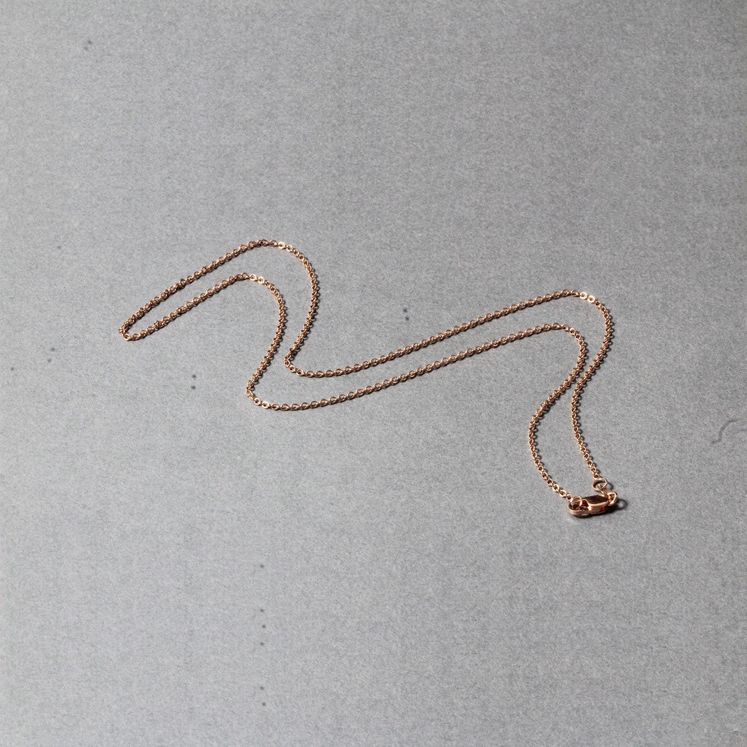 14k Rose Gold Round Cable Link Chain (1.25 mm) by Bids.com