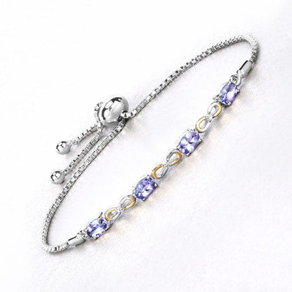 1.81 Carat Genuine Tanzanite and White Topaz .925 Sterling Silver Bracelet by Bids.com