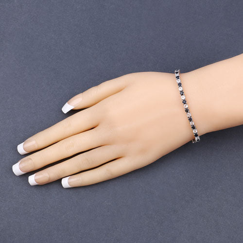 6.87 ct. t.w. Blue Sapphire and White Topaz Bracelet in Sterling Silver by Bids.com