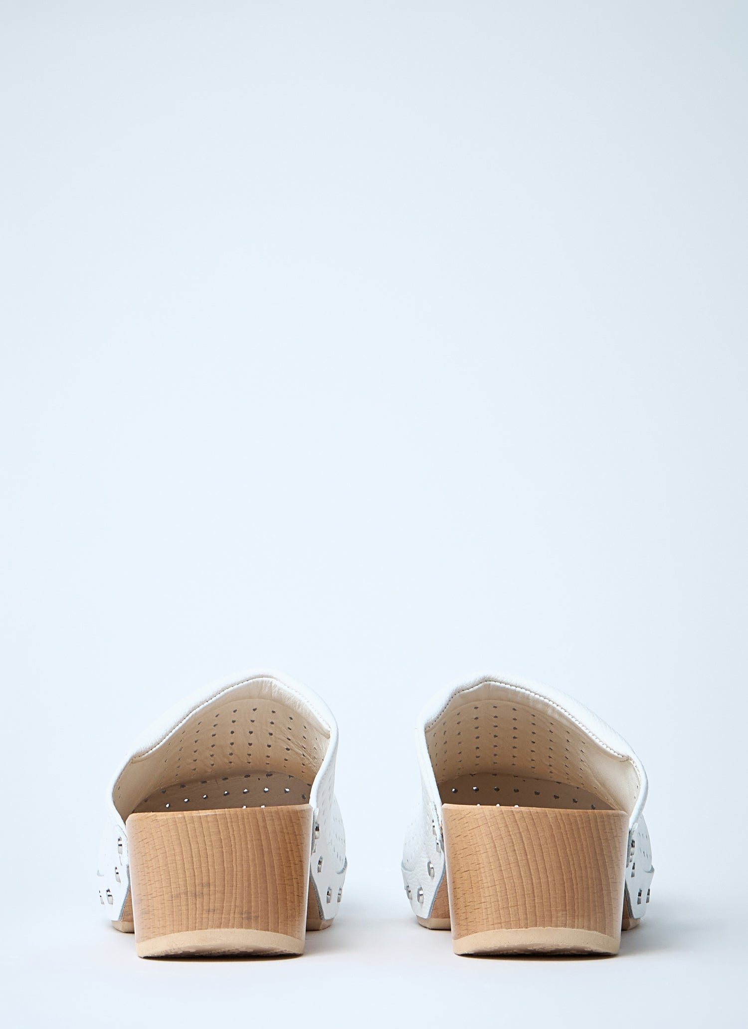 Balenciaga Women Perforated Heeled Clogs by Luosophy