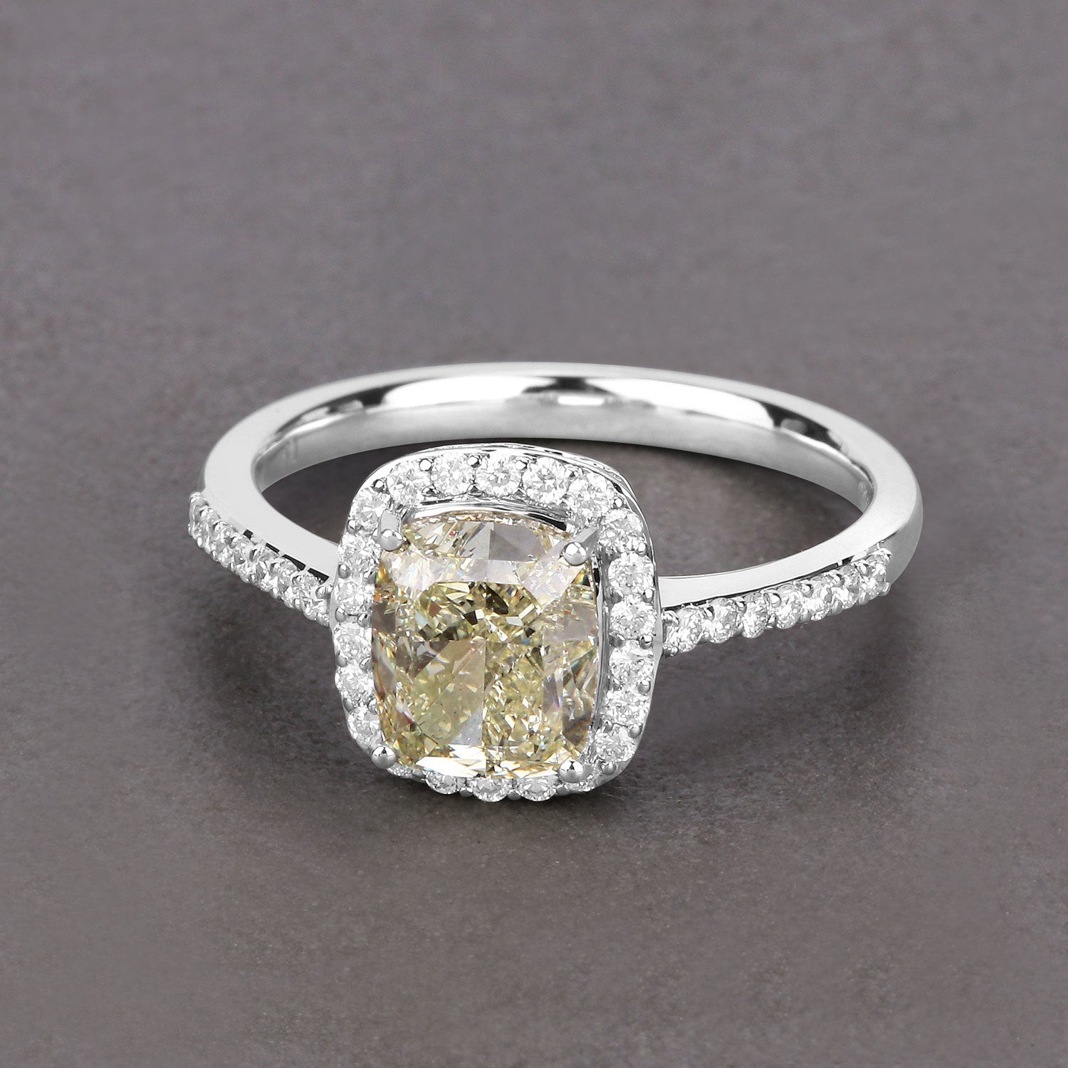 IGI Certified 2.05 Carat Genuine Light Yellow Diamond Center and 0.29cttw White Diamond 18K White Gold Ring (2.34cttw) by Bids.com