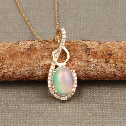 0.56 Carat Genuine Ethiopian Opal and White Diamond 14K Yellow Gold Pendant  DestGlow