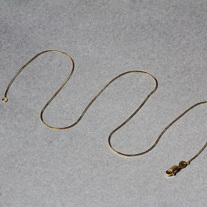 14k Yellow Gold Round Snake Chain 0.7mm by Bids.com