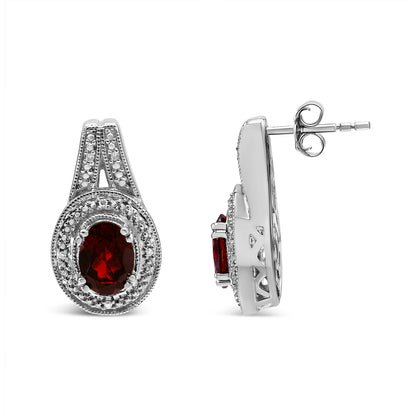 .925 Sterling Silver Diamond Accent and 8x6mm Red Oval Garnet Stud Earrings (I-J Color, I1-I2 Clarity) by Bids.com