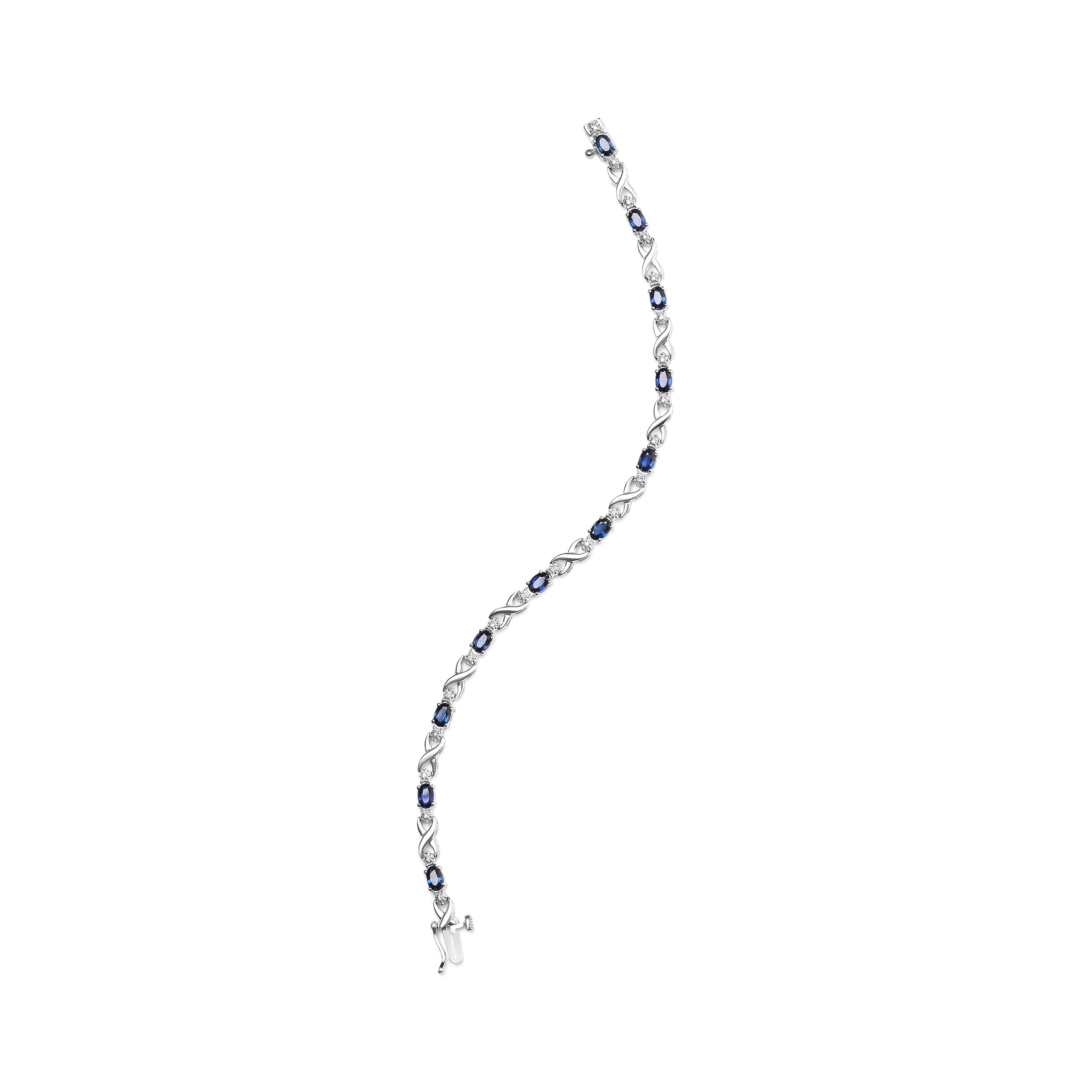 10K White Gold 5x4mm Oval Sapphire Gemstone and 1/10 Cttw Diamond Prong Set "X" Link Bracelet - Size 7" (H-I Color, SI1-SI2 Clarity) by Bids.com