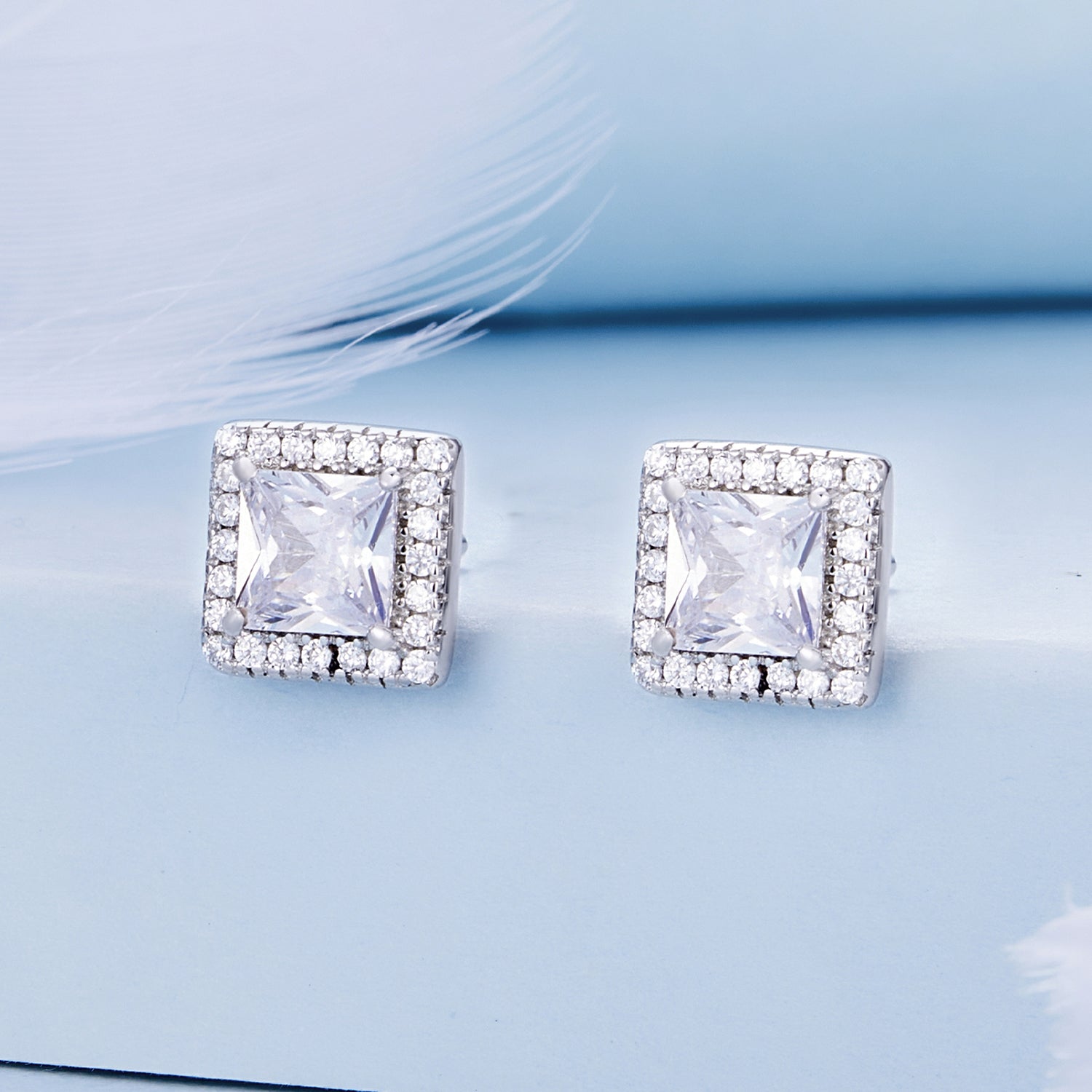 925 Sterling Silver Earrings with Pavé Setting CZ and Platinum Plating.  DestGlow