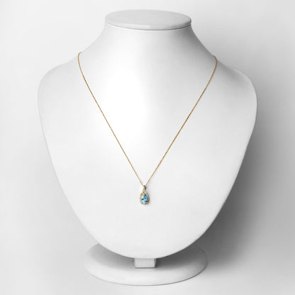0.89 Carat Genuine Swiss Blue Topaz and White Diamond 14K Yellow Gold Pendant by Bids.com
