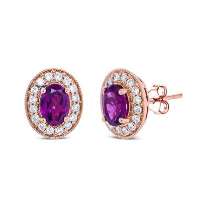 14K Rose Gold 7x5mm Oval Cut Garnet and 3/8 Cttw Round Diamond Halo Stud Earrings (G-H Color, SI1-SI2 Clarity) by Bids.com
