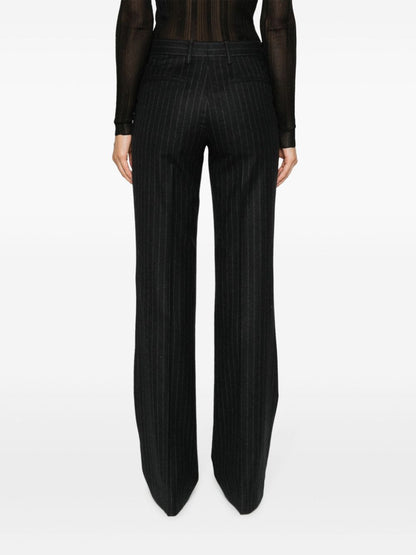 Dries Van Noten Women Pinstripped Wool Trousers by Luosophy