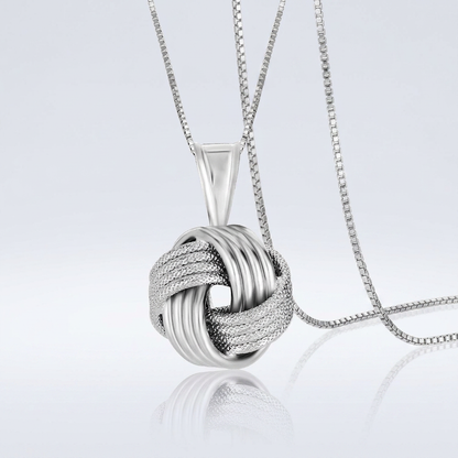 Sterling Silver Pendant with a Ridge Textured Love Knot Design