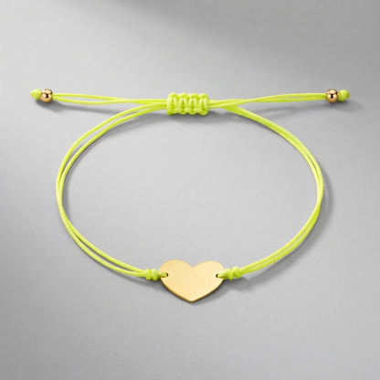 9 1/4 inch Yellow Cord Adjustable Bracelet with 14k yellow Gold Heart