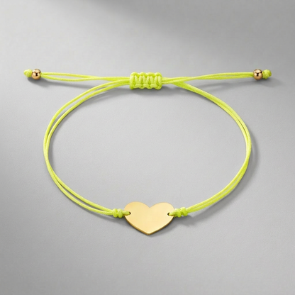 9 1/4 inch Yellow Cord Adjustable Bracelet with 14k yellow Gold Heart