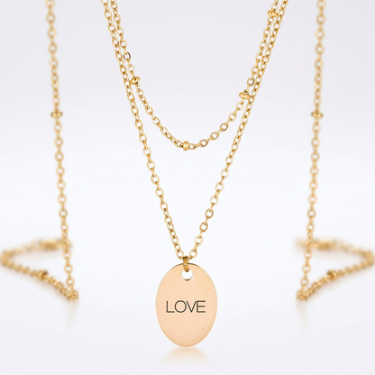 Avera Double Chain Love Necklace In Polished Gold Finish