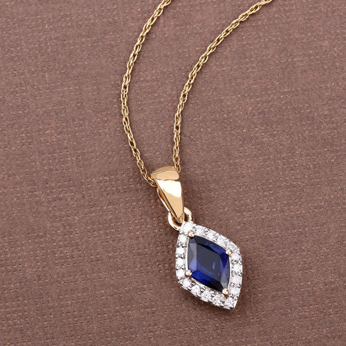 0.92 Carat Genuine Blue Sapphire and White Diamond 14K Yellow Gold Pendant by Bids.com