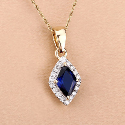 0.92 Carat Genuine Blue Sapphire and White Diamond 14K Yellow Gold Pendant by Bids.com