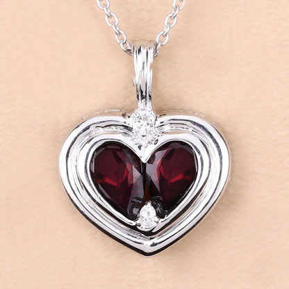 2.66 Carat Genuine Garnet and White Topaz .925 Sterling Silver Pendant by Bids.com