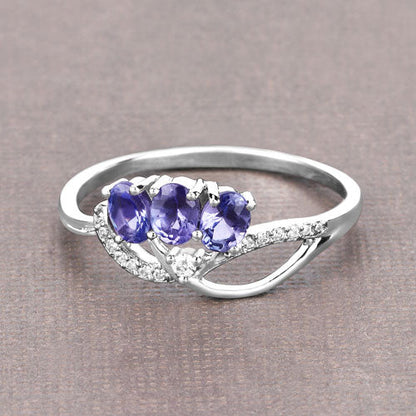 0.56 Carat Genuine Tanzanite and White Diamond 14K White Gold Ring by Bids.com