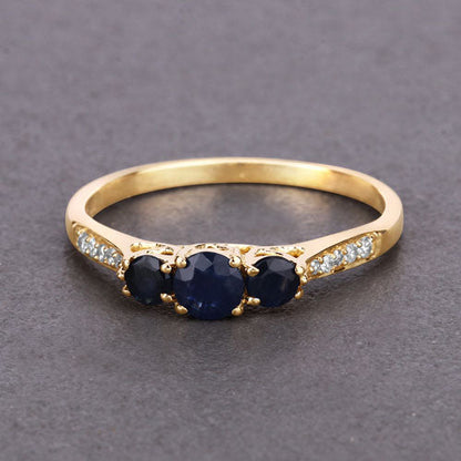 0.56 Carat Genuine Blue Sapphire and White Diamond 14K Yellow Gold Ring by Bids.com